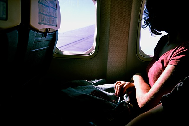 Image of student airplane passenger