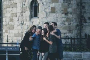 students taking a photo near attraction