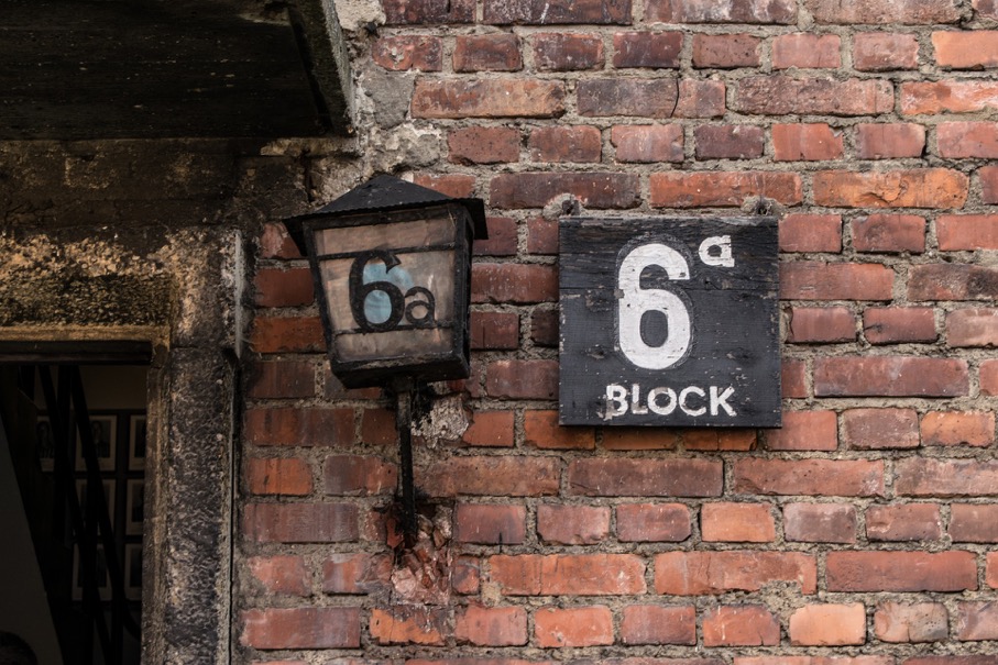 house sign brick wall